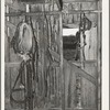 Harness and overalls in barn of Pomp Hall, Negro tenant farmer. Creek County, Oklahoma. See general caption number 23