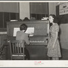Local singer entertaining at Jaycee buffet supper. Eufaula, Oklahoma. See general caption number 25