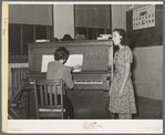 Local singer entertaining at Jaycee buffet supper. Eufaula, Oklahoma. See general caption number 25