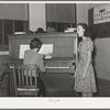 Local singer entertaining at Jaycee buffet supper. Eufaula, Oklahoma. See general caption number 25