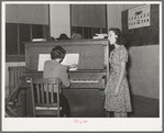 Local singer entertaining at Jaycee buffet supper. Eufaula, Oklahoma. See general caption number 25