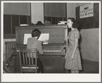 Local singer entertaining at Jaycee buffet supper. Eufaula, Oklahoma. See general caption number 25