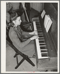 High school girl playing "America the Beautiful" as part of the Americanization program at high school. Eufaula, Oklahoma