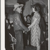 Farm boy and girl playing "Pleased or displeased" at play party in McIntosh County, Oklahoma. See general caption 26