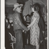 Farm boy and girl playing "Pleased or displeased" at play party in McIntosh County, Oklahoma. See general caption 26