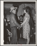 Farm boy and girl playing "Pleased or displeased" at play party in McIntosh County, Oklahoma. See general caption 26