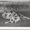 Basketball players resting between periods. Eufaula, Oklahoma