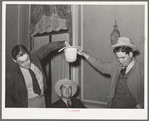 Young men drawing numbers from a hat at a contest at the Junior Chamber of Commerce luncheon. San Angelo, Texas