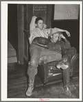 Cowboys in the hotel lobby during the San Angelo Fat Stock Show at San Angelo, Texas