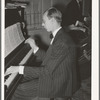 Piano player with the orchestra at a dance during the San Angelo Fat Stock Show, San Angelo, Texas