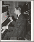 Piano player with the orchestra at a dance during the San Angelo Fat Stock Show, San Angelo, Texas