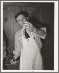 FSA supervisor exhibiting the type of knife he used in his meat cutting demonstration before a group of FSA supervisors and officials at a district meeting at San Angelo, Texas