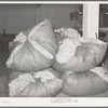 Freshly scoured and dried wool at wool scouring plant. San Marcos, Texas