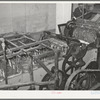Part of wool scouring machine. The metal forks pull the wool through the hot alkaline solution. Wool scouring plant, San Marcos, Texas