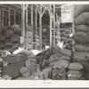 Wool and mohair in storage at Kimble County Wool and Mohair Warehouse, Junction, Texas. This company sells feed for livestock and chickens also