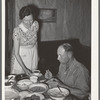 Dinner on ranch of rehabilitation borrower during goat shearing and kidding season. Kimble County, Texas