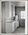 Detail of kitchen in house for permanent agricultural workers at the migratory labor camp. Robstown, Texas