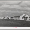 Houses for permanent agricultural workers at migratory labor camp. Robstown, Texas