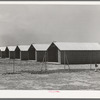 Sheet metal isolation units at the migratory labor camp. Sinton, Texas. These will be used for isolation of people at the camp with contagious diseases of a temporary nature