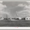 Group of houses for permanent agricultural workers at the migratory labor camp. Robstown, Texas