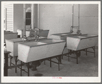 Laundry tubs at the migratory labor camp at Sinton, Texas