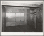 Upstairs bedroom and closet in multi-family unit for permanent agricultural workers at the migratory labor camp. Sinton, Texas