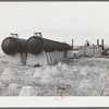 Wreckage of burned cotton gin and compress at Big Spring, Texas