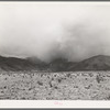 Snowstorm over the mountains in Socorro County, New Mexico. Snow in the mountains is an important source of water for the ranchers in this section