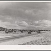 Highway crossing the desert in Sandoval County, New Mexico