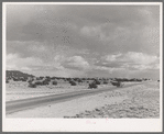 Highway crossing the desert in Sandoval County, New Mexico