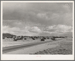 Highway crossing the desert in Sandoval County, New Mexico
