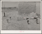 Grave in graveyard of Catholic church. Bernalillo County, New Mexico