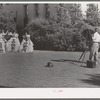 Young high school girls being photographed in their graduation play costumes. Phoenix, Arizona