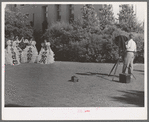 Young high school girls being photographed in their graduation play costumes. Phoenix, Arizona