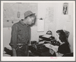 Migratory agricultural worker checking out of the Agua Fria migratory labor camp. Arizona