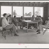 Meeting of the Ladies Aid Society with the camp manager at the Agua Fria migratory labor camp, Arizona. The Ladies Aid Society is mainly concerned with helping needy arrivals at the camp and sick persons