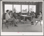 Meeting of the Ladies Aid Society with the camp manager at the Agua Fria migratory labor camp, Arizona. The Ladies Aid Society is mainly concerned with helping needy arrivals at the camp and sick persons