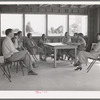 Meeting of the Ladies Aid Society with the camp manager at the Agua Fria migratory labor camp, Arizona. The Ladies Aid Society is mainly concerned with helping needy arrivals at the camp and sick persons
