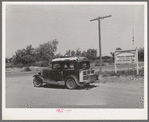 Migratory agricultural worker and his family leaving the Agua Fria migratory labor camp, Arizona. He was headed for California