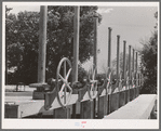 Valves to irrigation gates. Main irrigation canal in Maricopa County, Arizona