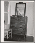Dresser in bedroom of an apartment at the Arizona part-time farms. Maricopa County, Arizona. The furniture in the apartment on this project was designed especially for them