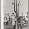 Cactus light standard in front of hotel in Phoenix, Arizona