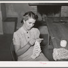 Member of the Arizona part-time farms crocheting in the community building on the project. Maricopa County, Arizona