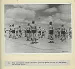 This photograph show children playing games in one of the camps for Polish boys.