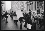 Marsha P. Johnson [walking in line wearing white scarf] and Gay Liberation Front women demonstrate at City Hall, New York