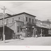 Store and gasoline pumps on main street of Mogollon, New Mexico. Second largest gold mine in the state. The inhabitants of the town are about evenly divided as to Spanish and Anglo-American