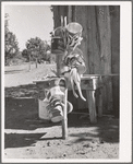 Milk buckets sunning. Pie Town, New Mexico