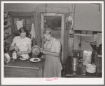 Mother and daughter working in the cafe kitchen. The daughter with her husband run the cafe. Pie Town, New Mexico
