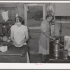 Mother and daughter working in the kitchen of the cafe at Pie Town, New Mexico. The daughter with her husband run the cafe