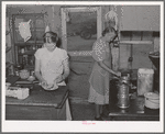 Mother and daughter working in the kitchen of the cafe at Pie Town, New Mexico. The daughter with her husband run the cafe